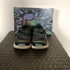 Sketchers lights kids shoes.